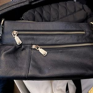 Black small - medium cross-body purse.